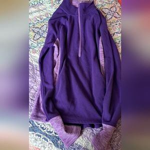 A Purple sweater without a hood
